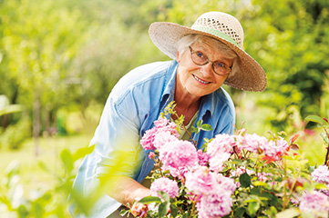 Photo of a woman gardening.
